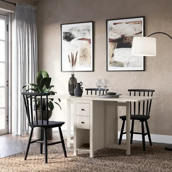 Compact Extendable Dining Table With Storage Drawers And Painted Finish